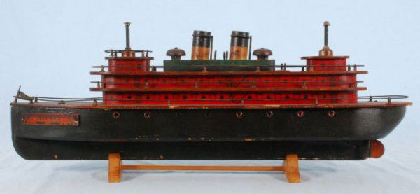 German Wind-Up Libertania Toy Ship: With Wooden Stand, No key. Measures 10" H x 28" L