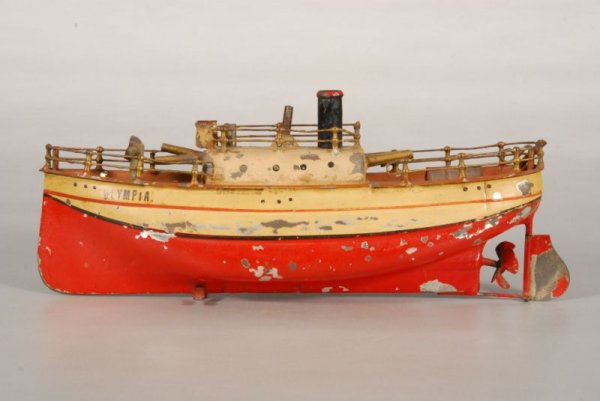 Olympia Battleship Clockwork Toy Boat: Possibly Fleischmann. "Olympia". Measures 9-1/4" L x 2-1/2" W x 3-3/4" H. (P978.101.707)