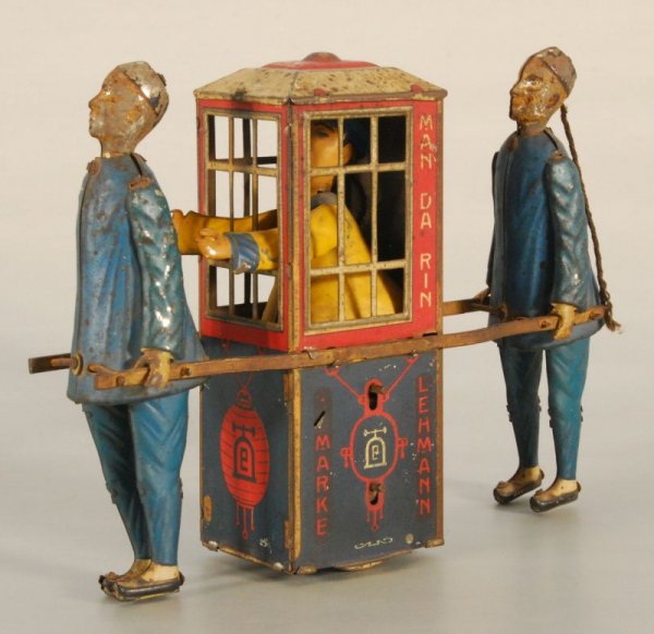 Lehmann Mandarin German Tin Wind-Up Toy: Lehmann Mandarin German Tin Wind-Up Toy In Working Condition, Made in Germany. "Marke". Measures 7-1/2" L x 5-1/2" H. (P978.101.525)