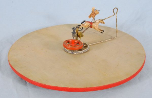 W. Britain Mechanical Equestrian Horse Racing Toy: "The Mechanical Equestrian" Horse Racing Toy, W. Britain Toy Co. Measures 13" Across (1978.101.478)