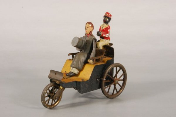 Lehman New World Cycle Tin Toy: Not complete. Measures 5" long x 3" wide x 4 1/2" tall. (P978.101.456)
