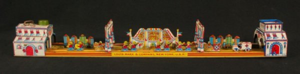Marx Wind Up Lithographed Tin Parade Toy: Measures 3" X 24" (P978.101.110)
