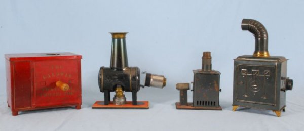 Collection of Magic Lanterns & Post Card Projector: 3 Magic Lanterns and 1 "Postcard Projector". Largest measures 9-1/4" x 6-1/4" x 7-3/4" H. (P984.105.02C; 02A; 978.101.819; ...817A 978.101.345A & B )