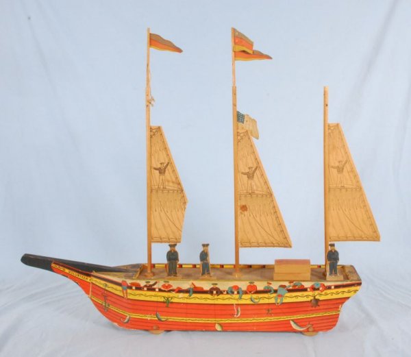 "Volunteer" Paper Over Wood Boat 1880s: "Volunteer". Paper on wood. Measures 5" X 32" Without Sails Up, (P978.101.76A)