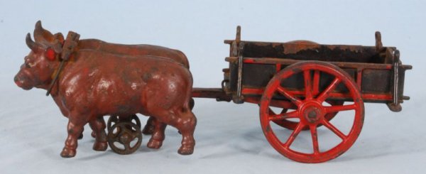 1887 Cast Iron Ox Cart Toy: Patented 1887. Cast Iron. Measures 13-1/2" L. (1978.101.639).