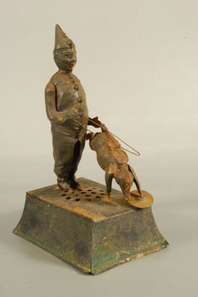 Wind-Up Clown & Dog Cymbal Toy: Does not work. Measures 9-1/4" H.