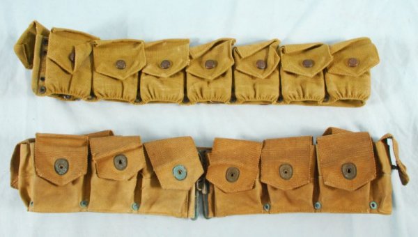 US Models 1916 & 1910 Ammo Belts: Two belts include: US Model 1916 Ammo Belt. Nine-pouch web belt with un-rimmed eagle snaps. Stenciled unit markings on inside; and US Model 1910 Ten Pocket Ammo Belt. Circa 1918. Possibly made by P.C