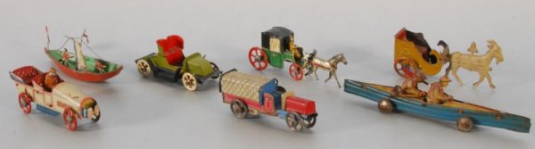Collection of 7 German Penny Toys: Cars Trucks And Boats, Largest Measures 2" X 5 1/2" (P78.101.80, 209, 208, 686, 213, 82, 455)