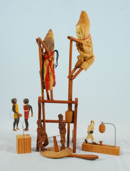 Collection of 5 Wood Jointed Toys: 3 Sets are Boxing/Sparing Toys. One set is Black Americana figures. Two dolls have celluloid faces. Tallest measures 16-1/2" H. (P978.101.2284; 689; 491; 527; 1716)
