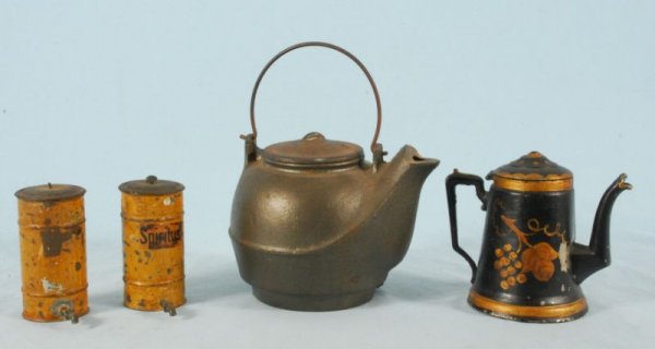 Collection of 4 Children's Toy Pots: Includes cast iron teapot, Tole painted Coffee pot, and 2 Urn/Dispensers, one with label "Spiritus". (P978.101.1098A; 317; 1092A; 772)