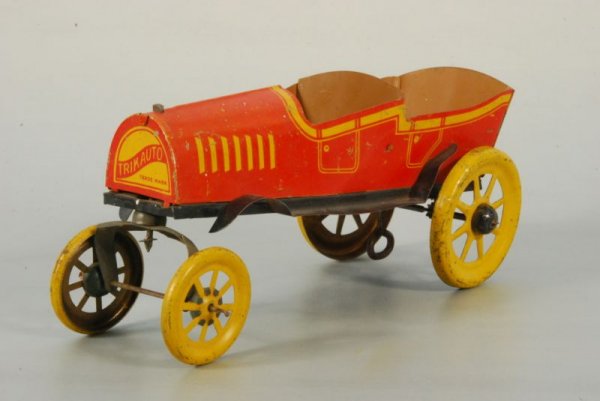 Strauss Trik Auto Tin Wind-Up Toy Car: Measures 8" Ll. (P978.101.684).