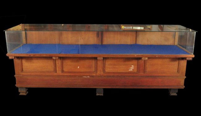 Walnut Country Store Display Case: Measures 97-3/4 L. x 27" D x 41" H."