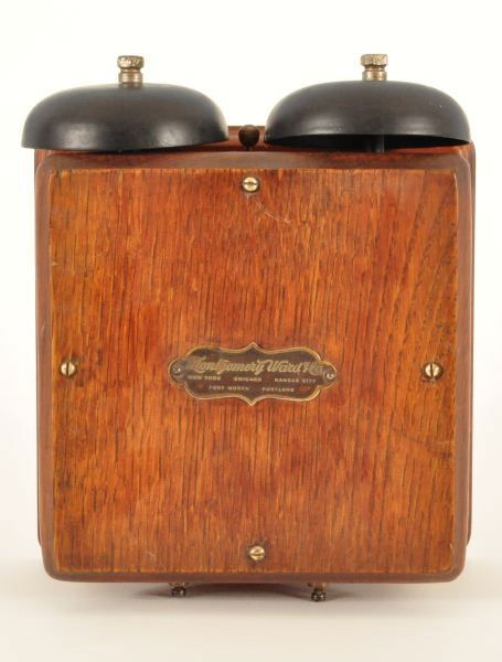 Oak Montgomery Ward Telephone Ringer Box: Metal label reads Montgomery Ward Co. Fort Worth, New York, Chicago, Kansas City, Portland". Measures 7" x 8" x 4"."