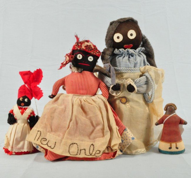 Collection of 4 Black Americana Rag Doll Figures: Includes Black & White Topsy-Turvy" Doll With "New Orleans" on Dress (13"); Mammy Bell (6" H); Painted Cloth Figure (4-1/4" H); Doll Made from Plastic Bath Soap Bottle (11-3/4" H)."