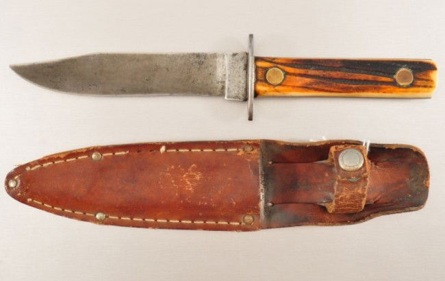 Bone Handle Bowie Knife With Sheath: Blade measures 5 L."