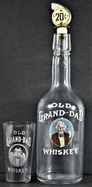 Enamel Label Bottle, Old Grand-Dad Whiskey: Enamel Label Back Bar Bottle for Old Grand-Dad Whiskey and etched high ball glass. 20 Cent shot stopper on bottle. Crescent interior crack at top of bottle, one small lip chip on glass. Bottle 11 1/4,