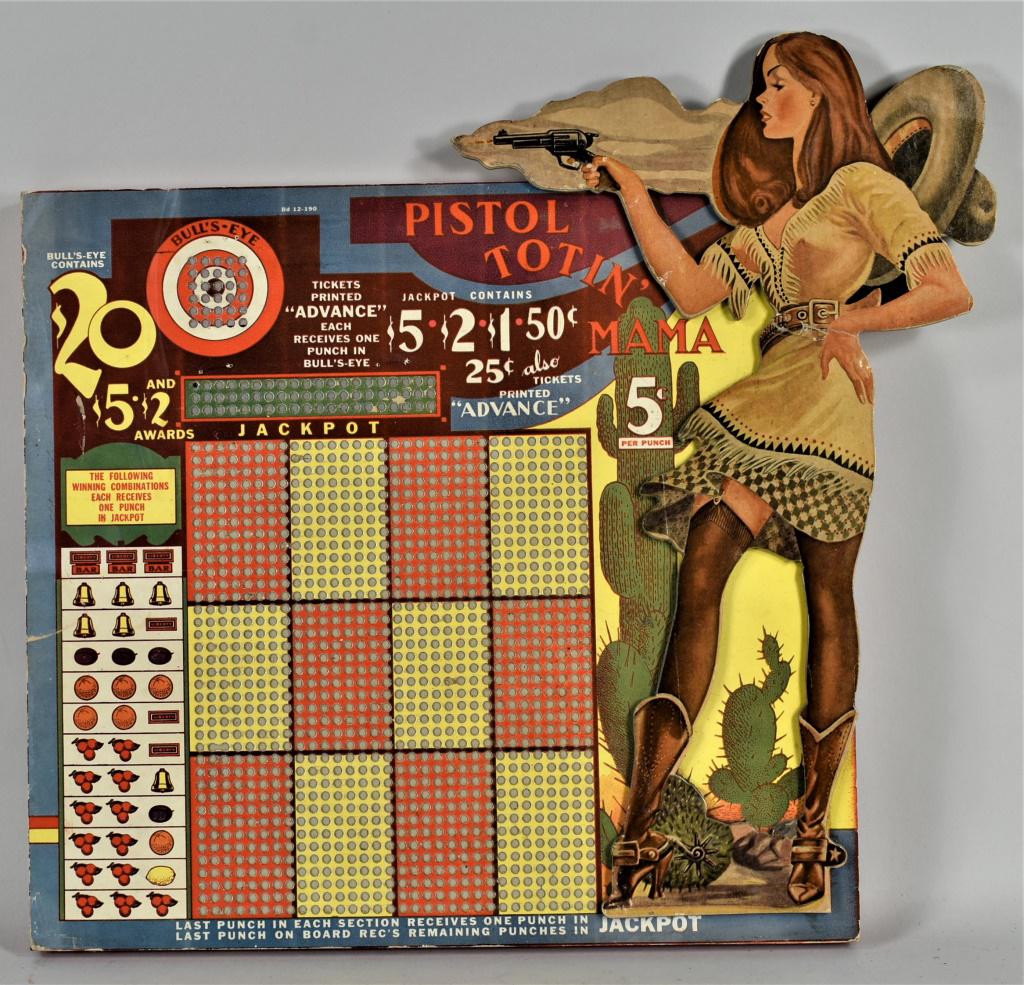 Pistol Totin' Mama Antique Punch Board: Pistol Totin' Mama Antique Punch Board. 5 cents per punch. Depicting provocative cowgirl with snappy stiletto boots! Crease at waste and very minor edgewear, excellent color and graphics. 15 3/4 X 14 