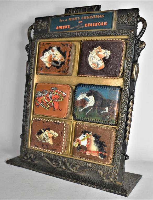 Amity Cast Iron Leather Novelty Western Americana Wallet Display: Amity Cast Iron Leather Novelty Western Americana Wallet Display. Fabulous store display full of vintage horse motif hand tooled leather wallets. Display complete and comes with extra sheets of holida
