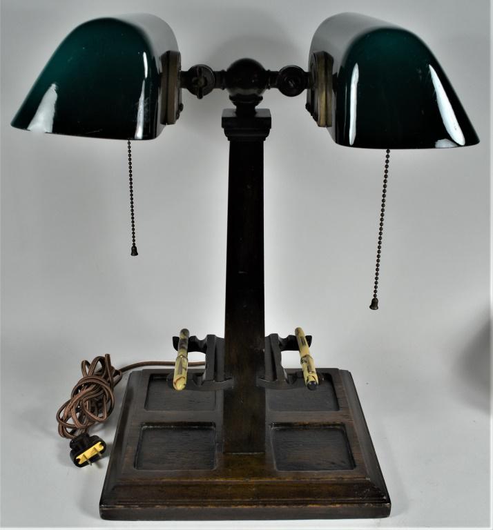 Mission Style Partners "Bankers" Desk Lamp Writing Station: Mission Style Partners "Bankers" Desk Lamp Writing Station. Amronlite- Amron Mfg. Co. Chicago. Inkwell station in oak base with pen holders. Comes with two antique writing pens. Excellent working cond