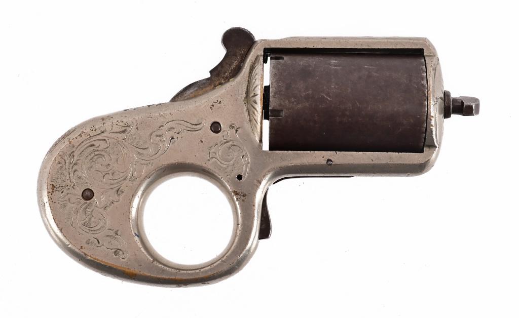 Engraved James Reid "My Friend" KnuckleDuster .32: S/N 12274. Engraved, nickel plated frame. Good action and lockup, bore shows some pitting and browning.