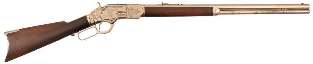 Engraved Winchester Model 1873 Rifle: Period engraved thumb print dust cover. Older refinished nickel.