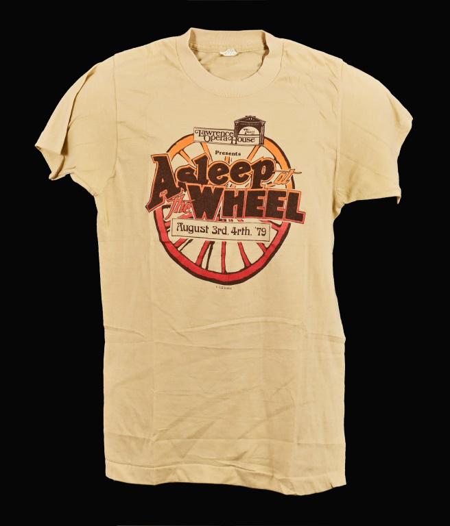 Asleep At The Wheel Vintage T-Shirt 1979: "Lawrence Opera House Presents Asleep At The Wheel, August 3rd, 4rth, '79". Size small 34-36 From Ray Benson's personal collection.