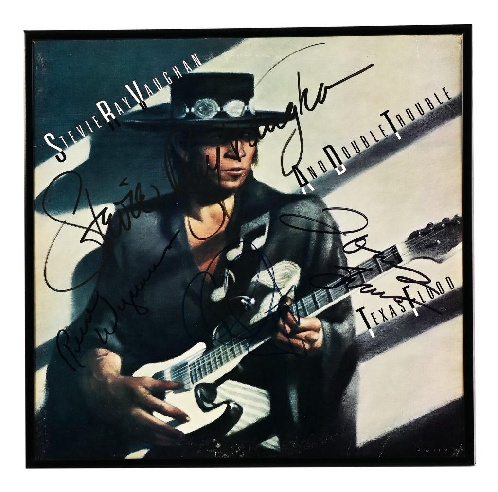Stevie Ray Vaughan Autographed Album: Stevie Ray Vaughan And Double Trouble Signed "Texas Flood" Album Cover. 12.75 X 12.75 inches. NOT FROM RAY BENSON'S COLLECTION.
