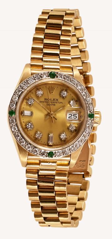 Rolex Ladies Oyster Perpetual Date Presidential: Presidential diamond face numerals, diamond and emerald bezel.