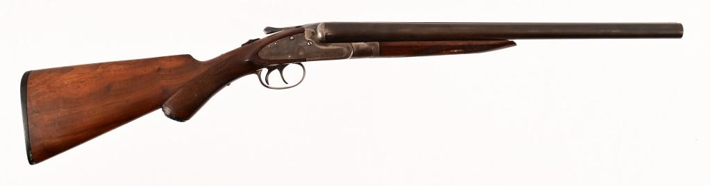 American Gun Co. Knickerbocker 12 GA Coach Gun: S/N 139531, Mfd. 1891. Side-by-side 18.5" barrels, checkered wood stock. Case coloring seen on receiver frame. Good bore and action. Antique