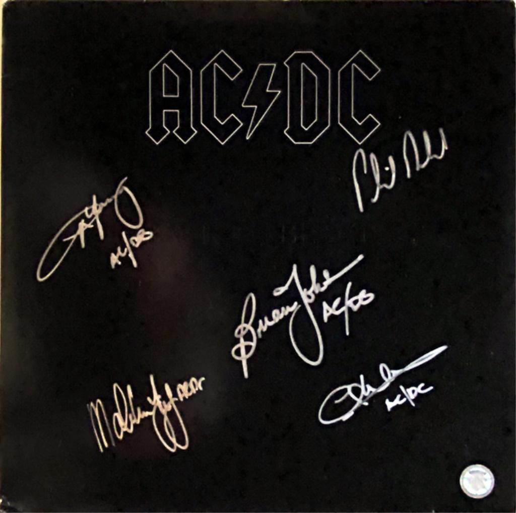 AC/DC Back In Black Band Signed Album: AC/DC Back In Black signed album autographed by Brian Johnson, Angus Young, Malcolm Young, Cliff Williams and Phil Rudd. 12x12 inches, vinyl included. GFA authenticated.