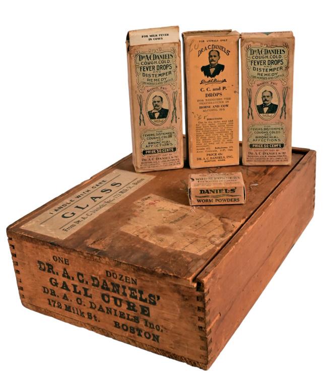 Dr. A.C. Daniels Remedies For Horses and Cattle: Collection of four remedies in original boxes in an original Dr. A.C. Daniels wood crate 10 1/4" x 7" x 3".