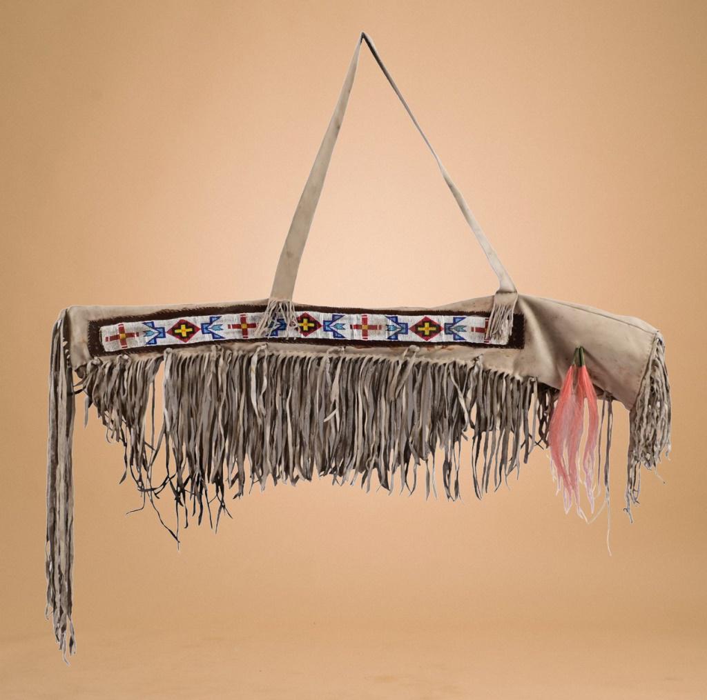 Sioux Beaded Buckskin Rifle Sheath: Horsehair tassles, Sioux bead work. Measures approximately 64" down to the fringe.