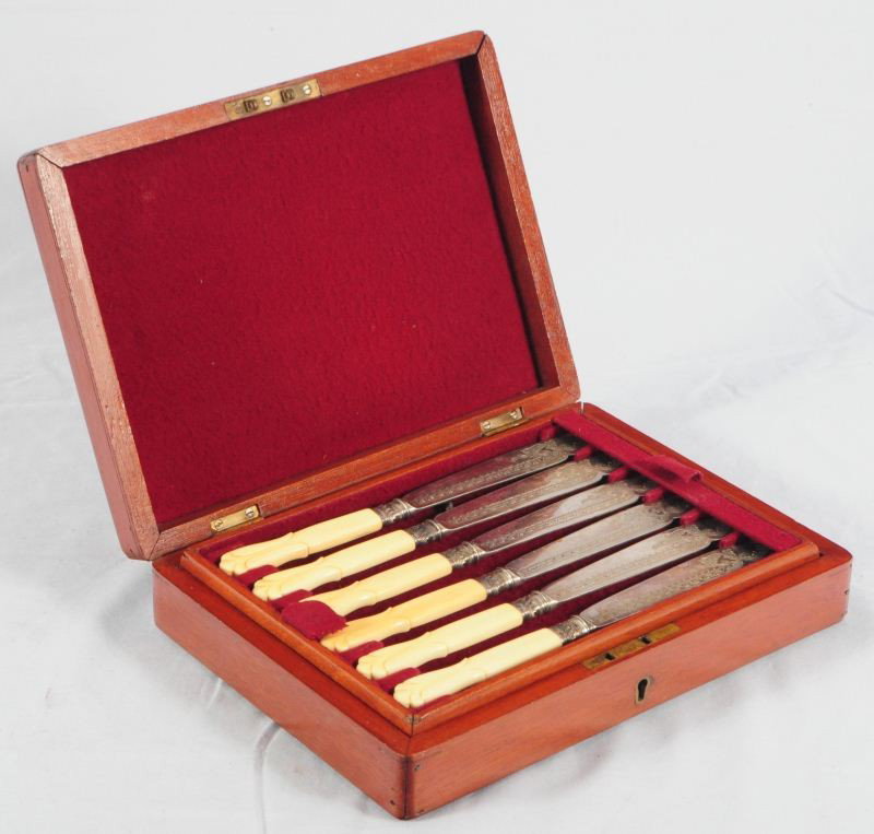 Engraved Ivory Handled Knife & Fork Cased Set: Circa 1860s. Engraved. Heavily Proof Marked. In Original Case with Key. 6 Place Settings. Measures 10" x 7" From an San Antonio Estate.