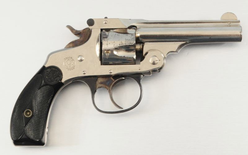 Smith & Wesson .32 Revolver: Good Working order with some finish loss on the cylinder. Serial # 207085