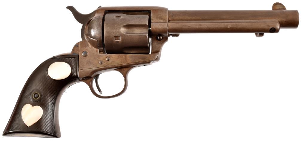 William S. Hart's Colt Model 1873 SAA .45: * Backstrap is engraved "Wm. S. Hart from K.L Hart 12-25-02". Checkered grips, with inlayed mother-of-pearl hearts. Was presented 5.5" barrel. serial no. 235942. Modern