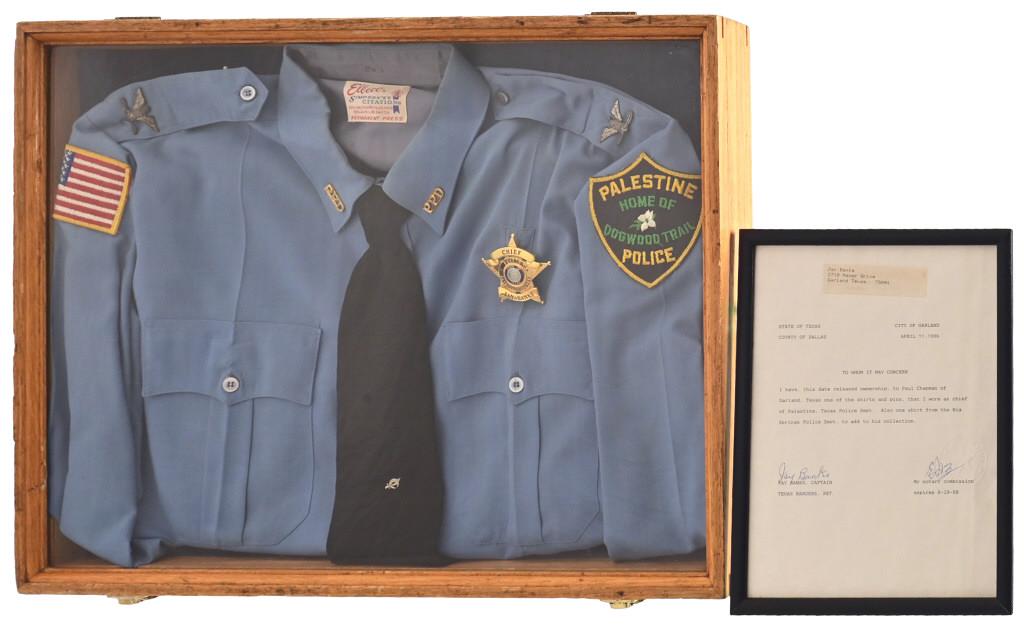 Captain Jay Banks Chief Of Police Uniform Shirt: Police Chief of Palestine, Texas Police Department, Jay Banks uniform shirt and badge. Displayed in a shadow box. 24" X 18". Comes with a framed signed letter from Jay Banks releasing ownership to Pau