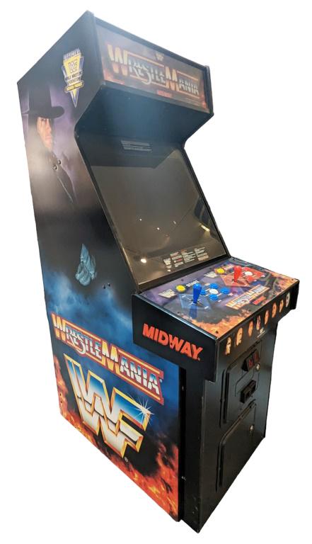 Steve Austin Signed Wrestle-Mania Midway Arcade: Turns on, sound and gameplay can be heard. Screen has issue lighting up, could also use a new power chord.