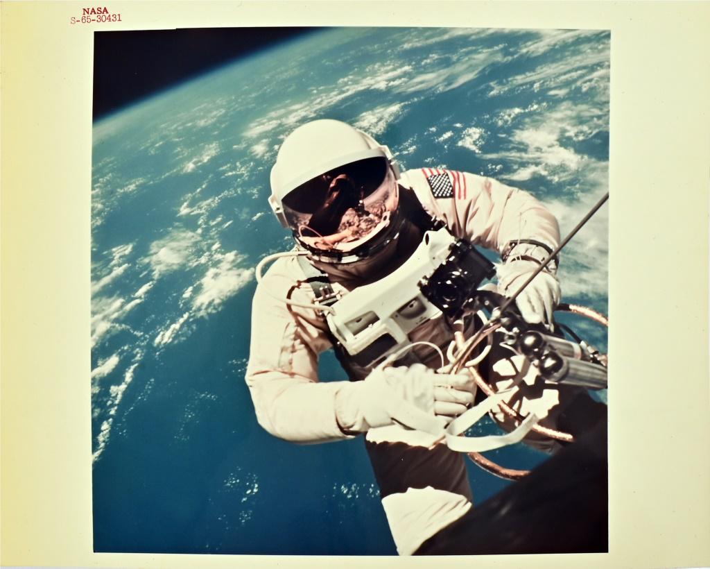 Ed White NASA Red Number Space-Walk EVA Photo: NASA Red Number S-65-30431 Kodak photo 8" x 10". (3 June 1965) --- Astronaut Edward H. White II, pilot of the Gemini IV four-day Earth-orbital mission, floats in the zero gravity of space outside the 