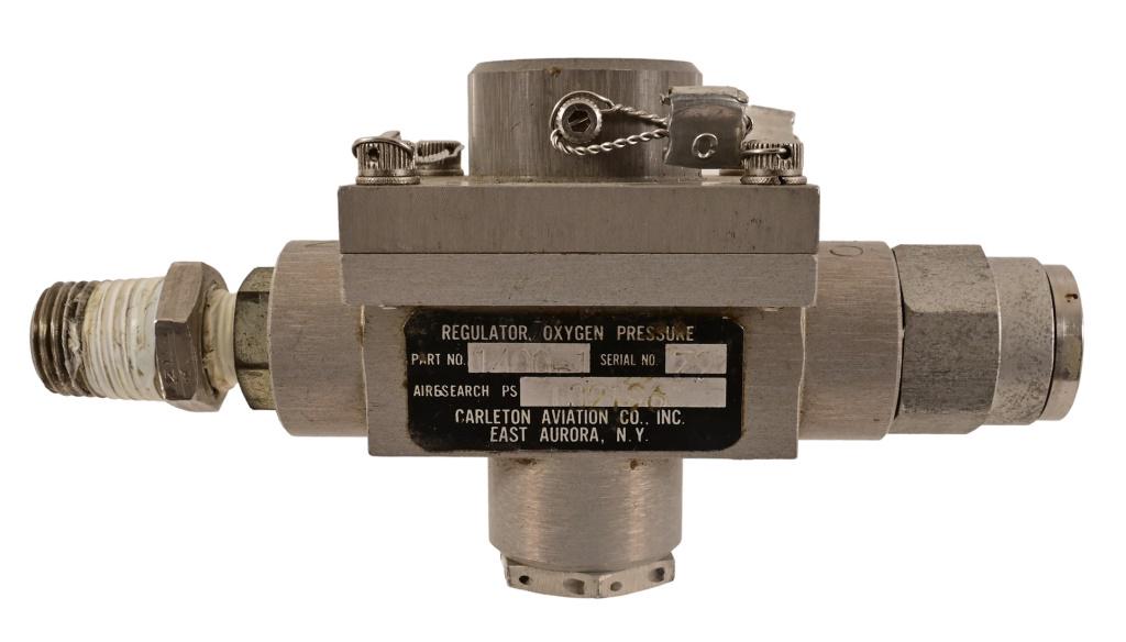 NASA Hand-Held Self Maneuvering Unit Space Used: NASA Apollo program mission used Oxygen Pressure Regulator from the Hand-Held Self Maneuvering Unit designed by Harold Iver Johnson and seen used by Astronaut Ed White during his historic Space-Walk, 