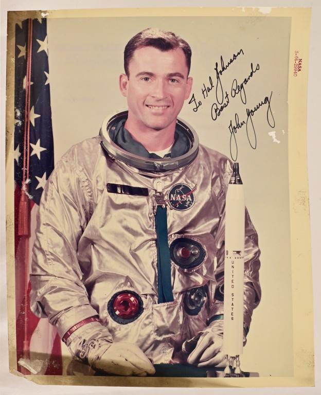 Astronaut John Young Signed NASA Red Number Photo: NASA Manned Spacecraft Center Official Photograph of astronaut John Young, taken September 10, 1964. Inscribed "To Hal Johnson, Best Regards, John Young". A member of the "New Nine" astronaut selectio