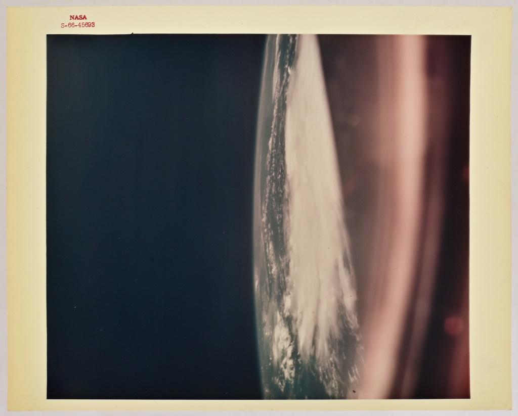 Gemini X Hurricane Celia NASA Red Number Photo: NASA Red Number S-66-45693 Kodak photo 8" x 10". Photograph of Hurricane Celia; Cuba and Florida-Georgia-Carolina coast on horizon taken during the Gemini X mission on July 19,1966.