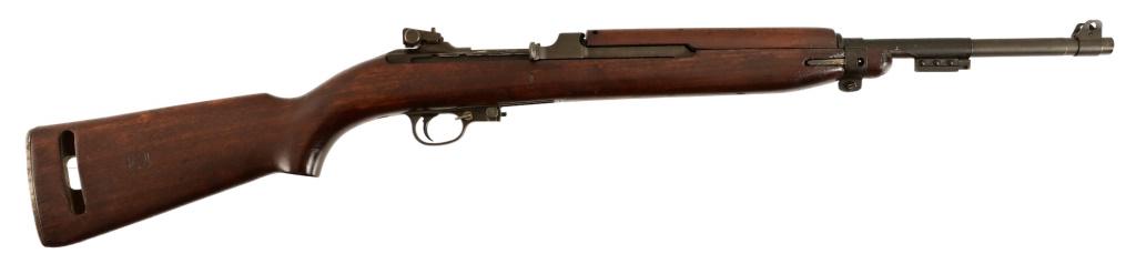 Inland Division M1 Carbine .30 Cal: S/N 5541284. Bayonet fitting, 18" barrel, original wood stock. Mechanically good condition, with good bore and rifling. Visible cartouche on right side of stock, arsenal numbers stamped underside of s