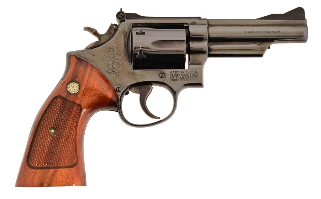 S&W Model 19-3 Revolver .357 Magnum: S/N K946577. Blue finish with premium Goncalo Alves (tigerwood) checkered wood grips, standard trigger and hammer. 4" barrel.