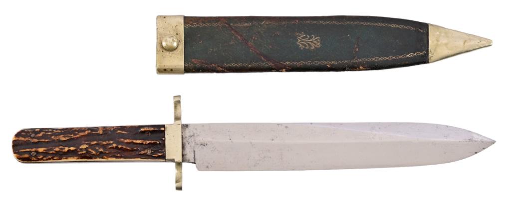 Manson Sheffield Stag Handle Fighting Knife: Blade measures 7.75" with etching " The American's Pride, Equal Laws, Equal Rights, And Justice For All." Overall length 12.25". With original sheath