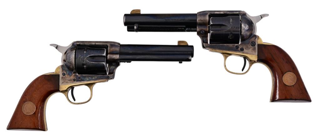 Pair of Uberti1873 Cattleman SAA Revolvers: Sequential Serial Numbers U69787/ U69788. Case hardened frame, 357/38 cal. Genuine Indian Head pennies set in walnut grips. The last two digits of gun serial number matches year of pennies set in grip