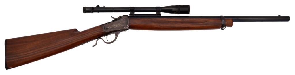Engraved Winchester Model 1885 Low-Wall .22 Hornet: S/N 121168, manufactured 1917. Equipped with Weaver, El Paso Model 330 scope with Varmint Master sun shade. Heavy barrel measures 24". Very good action and bore.
