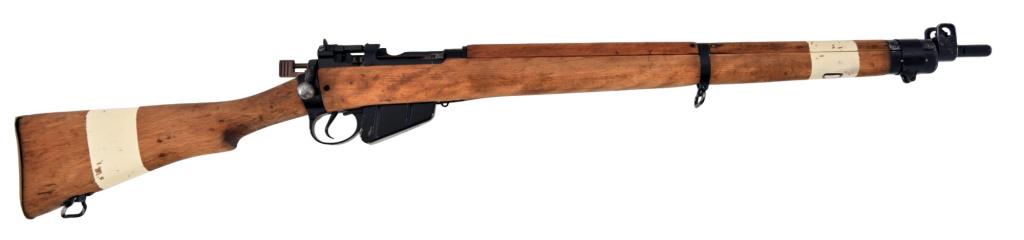 Armourer's Shop Drill Rifle: SN 215031. Enfield No. 4 non-firing drill rifle. Marked L59A. Has cutout on left side showing barrel internals. Good condition. Not a functional gun.