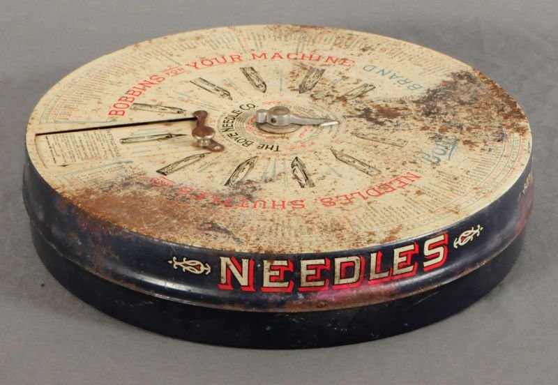 The Boye Needle Co. Bobbin Dispenser: "Needles, Shuttles, & Bobbins For Your Machine". Measures 16" diameter.