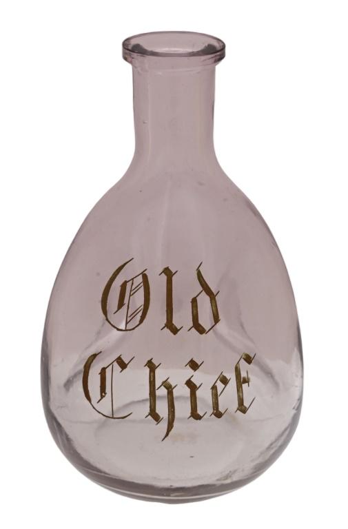 Collection of (4) Saloon Back Bar Whiskey Bottles: Saloon bottle collection of back bar bottles with gold lettering. Jamaican Rum bottle 12" Tall. Old Pioneer Glass Whiskey Decanter. Lewis & Clark Glass Whiskey Bottle. Old Chief Whiskey bottle.