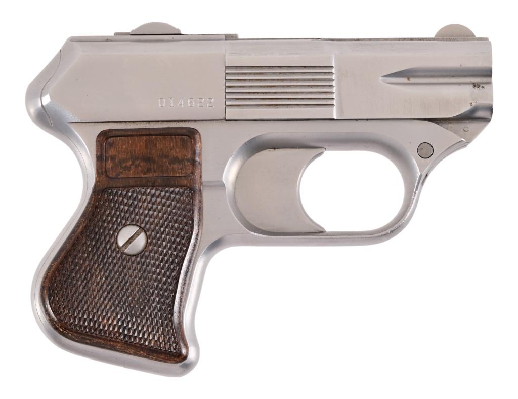 COP Inc. Derringer .38 Special / .357 Mag: S/N 014622. Stainless steel finish with 3" barrels, Good condition. Modern.